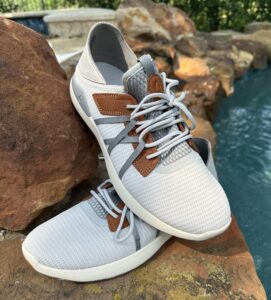 Olukai White Slip-On Laced Sneakers.