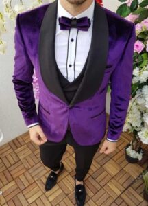 Photo of man wearing Purple Tuxedo Jacket and Purple Bow Tie