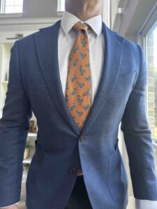 Blue Blazer and Orange Tie